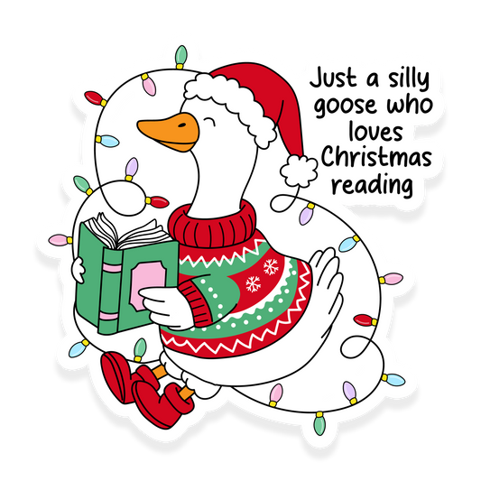 Goose in Christmas sweater and Santa hat reading a book wrapped in holiday lights.