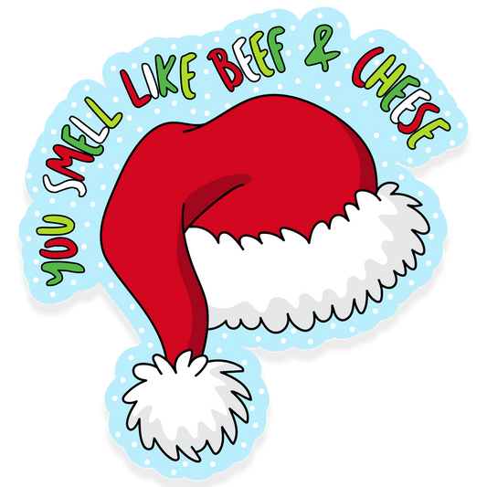 A Christmas sticker featuring a red Santa hat on a blue snowy background with the quote “You smell like beef & cheese.”