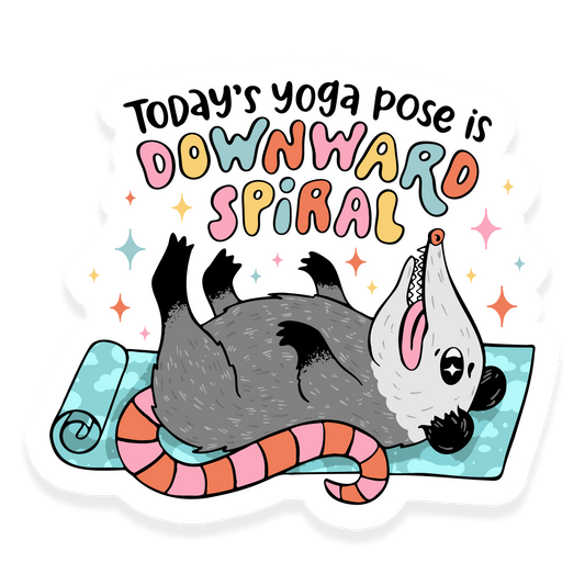 Possum lying upside down on a yoga mat with the phrase 'Today's yoga pose is downward spiral.'