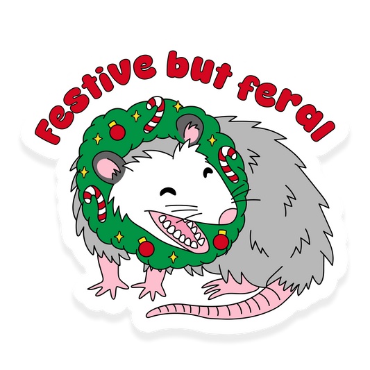 Possum wearing a Christmas wreath with candy canes and ornaments with the text 'Festive but feral.'