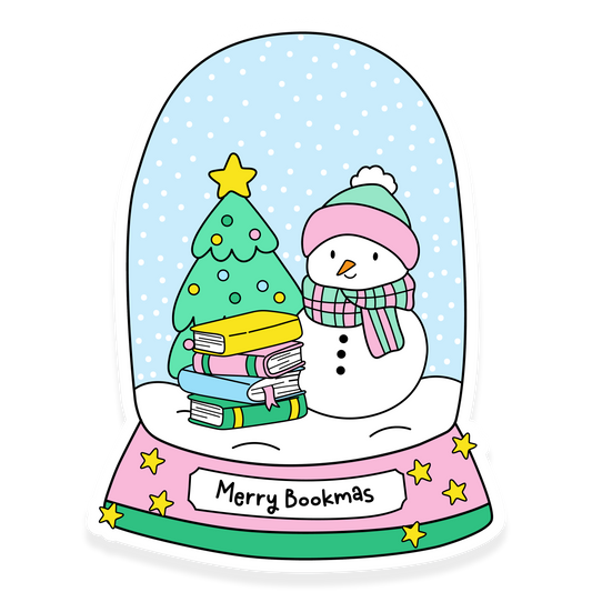 Snow globe sticker with a snowman, Christmas tree, and stack of books labeled Merry Bookmas.